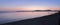 Panorama of sunset over beach