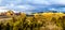 Panorama of a Sunset over Thunder Mountain and other red rock mountains surrounding the town of Sedona, Arizona