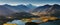 Panorama at sunset of Roys Peak between Wanaka and Queenstown with a lake and Mount Aspiring and cook of the new zealand alps.