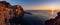 Panorama of sunset view of Manarola, one of the five Mediterranean villages in Cinque Terre, Italy, famous for its colorful houses