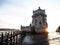 Panorama sunset view of medieval historic defense fortification bastion Torre Belem Tower in Tagus river Lisbon Portugal