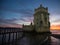 Panorama sunset view of medieval historic defense fortification bastion Torre Belem Tower in Tagus river Lisbon Portugal