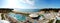 Panorama of swimming pools and bar by a beach