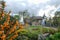 Panorama taken on a sunny spring day of Pinner Memorial Park, UK, West House and the Heath Robinson Museum in the background.