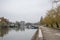 Panorama of the Tamis river, on Pancevo Waterfront in the center of the city, during a cloudy afternoon. Iconic silos are visible