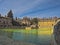 Panorama of  thermal pool and ancient farmhouses.