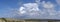 Panorama Thunder cloud formation - cumulonimbus above a dune landscape on Terschelling The Netherlands