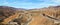 Panorama of Tizi n'Tichka mountain pass in High Atlas range, Morocco - serpentine curved roads over hills