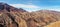 Panorama of Tizi n`Tichka mountain pass in High Atlas range, Morocco, small houses at background