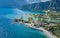 Panorama of Torbole a small town on Lake Garda, Italy. Europa.beautiful Lake Garda surrounded by mountains in the summer time