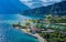 Panorama of Torbole a small town on Lake Garda, Italy. Europa.beautiful Lake Garda surrounded by mountains in the summer time