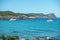 Panorama on the tourist beach of Cala Nova on the island of Ibiza in summer 2024