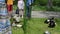 Panorama of tourist people group watch farm grown bird species