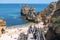 Panorama of the tourist Praia do Camilo de Lagos in the Algarve, Portugal in the summer of 2022