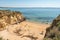 Panorama of the tourist Praia do Pinhao de Lagos in the Algarve, Portugal in the summer of 2022