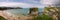 Panorama of Towan beach and The Island rocky outcrop linked by Suspension Bridge in Newquay, Cornwall,