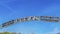 Panorama Towering steel arch at the entrance to the city of Ogden in Utah