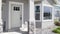 Panorama Townhouse exterior with white front door and bay windows