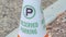 Panorama Traffic cone with Reserved Parking sign close up