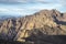 Panorama from trail to Toubkal, ridges and highest peaks of Atlas mountain in Morocco on sunrise