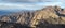 Panorama from trail to Toubkal, ridges and highest peaks of High Atlas mountain in Morocco on sunrise