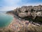 Panorama of Tropea, Italy and the crowded beach of bathers