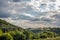 Panorama of a typical serbian rural landscape with farm estates, forest, buildings and barns surrounded by fields in barajevo