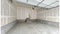 Panorama Unfinished garage interior with white markings on the wall