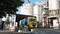 Panorama of unloading grain trucks at elevator on elevating hydraulic platform unloader. Grain crops transshipment at