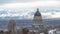 Panorama Utah State Capitol Building against Salt Lake City landscape and snowy mountain