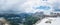 Panorama of Val di Fassa and Dolomites Alps, Italy. Thunderstorm and rain shaft over the valley