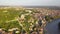 Panorama of Verona historical city centre, bridges across Adige river. Medieval buildings with red tiled roofs, Italy.Aerial video