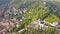 Panorama of Verona historical city centre, bridges across Adige river. Medieval buildings with red tiled roofs, Italy.Aerial video