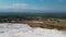 Panorama view from above on Pamukkale . Aerial view of Hierapolis Ancient Greco-Roman city in Turkey