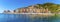 A panorama view across the breakwater and harbour of Porto Venere, Italy
