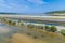 A panorama view across channels feeding the concentration salt pans at Secovlje, near to Piran, Slovenia