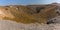 A panorama view across a crater on the volcanic island of Nea Kameni, Santorini