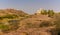 A panorama view across the desert rock park towards the Jaswant Thada monument above the city of Jodhpur, Rajasthan, India