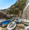 A panorama view across fishing boats on the quayside at Praiano. Italy on the Amalfi coast