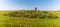 A panorama view across neolithic stones in the Cotswold hills, UK