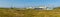 A panorama view across the salt marshes at West Mersea, UK