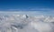 Panorama view of the Alps near Zermatt above a sea of clouds with the famous Matterhorn and Dent Blanche peeking out above the clo