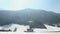 Panorama view of amazing mountain range, bright sunshine in cloudless blue sky