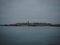 Panorama view of atlantic coast walled city historical old town of Saint Malo at blue hour from Dinard Brittany France