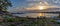 Panorama view of the boat ramps and small fishing boats in Athopol harbor on the Black Sea at sunrise