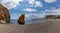 Panorama view of Calahonda beach with cliffs and colorful fishing boats