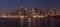 Panorama view of Canary Wharf district at dusk
