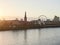 Panorama view of the city of Dusseldorf from the Rhine in Germany. Skyline of the old town with Ferris wheel at sunrise
