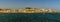 A panorama view of the Commercial Square, Castle Hill, and old quarter of Lisbon, Portugal seen from the Tagus river