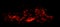 Panorama view the dying fire and hot red sparks on a black background